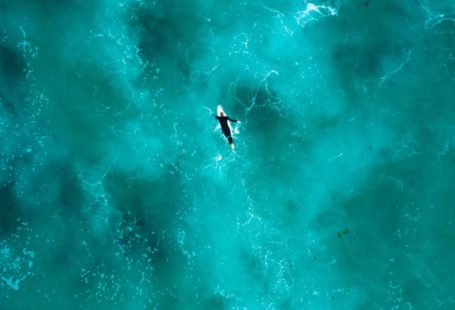 Silfra Diving - Aerial Photography of Person Surfing