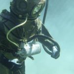 Deep Diving - Person in Green Scuba Diving Suit