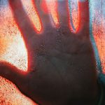 Decompression Sickness - Hand Touching Glass