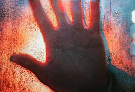 Decompression Sickness - Hand Touching Glass