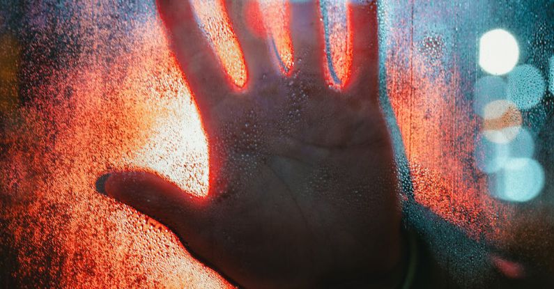 Decompression Sickness - Hand Touching Glass