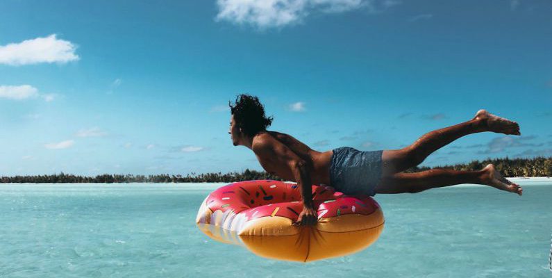 French Polynesia - Man With Floater