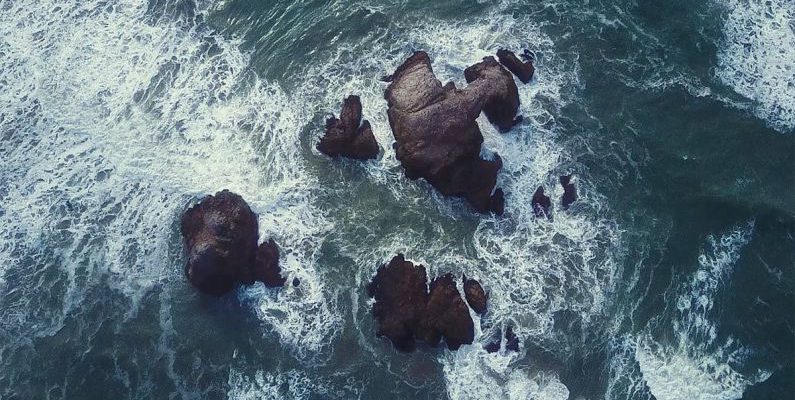 Nitrox Diving - Splashing Wave on Rock
