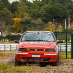 Drift Diving - A car is driving on a dirt track
