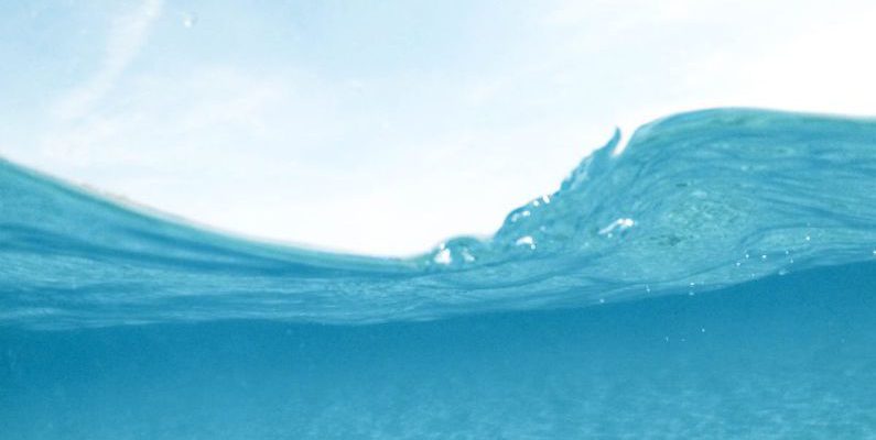 Snorkeling Transition - Man Diving on Body of Water
