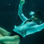 Seahorse Diving - Person Wearing White Long-sleeved Shirt in Underwater