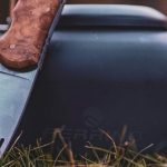 Renting Gear - A knife and a kettle sitting on the grass