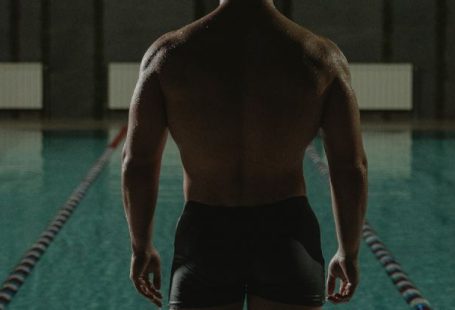 Fit Diving - Man in Black Shorts Standing on Swimming Pool