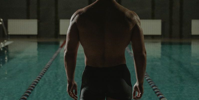 Fit Diving - Man in Black Shorts Standing on Swimming Pool