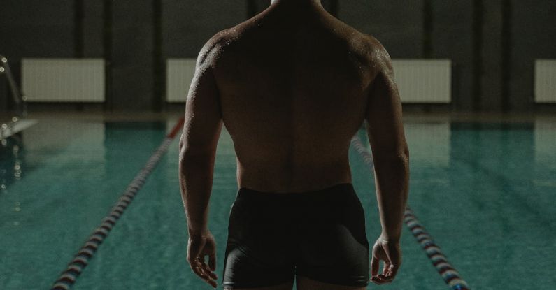 Fit Diving - Man in Black Shorts Standing on Swimming Pool